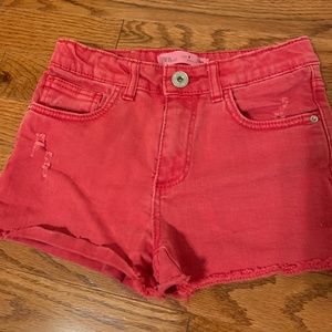 Red denim shorts